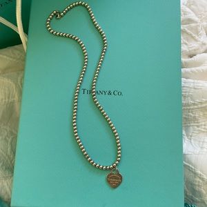 100% Authentic Tiffany and co necklace Serling silver. Could use a cleaning. 18”